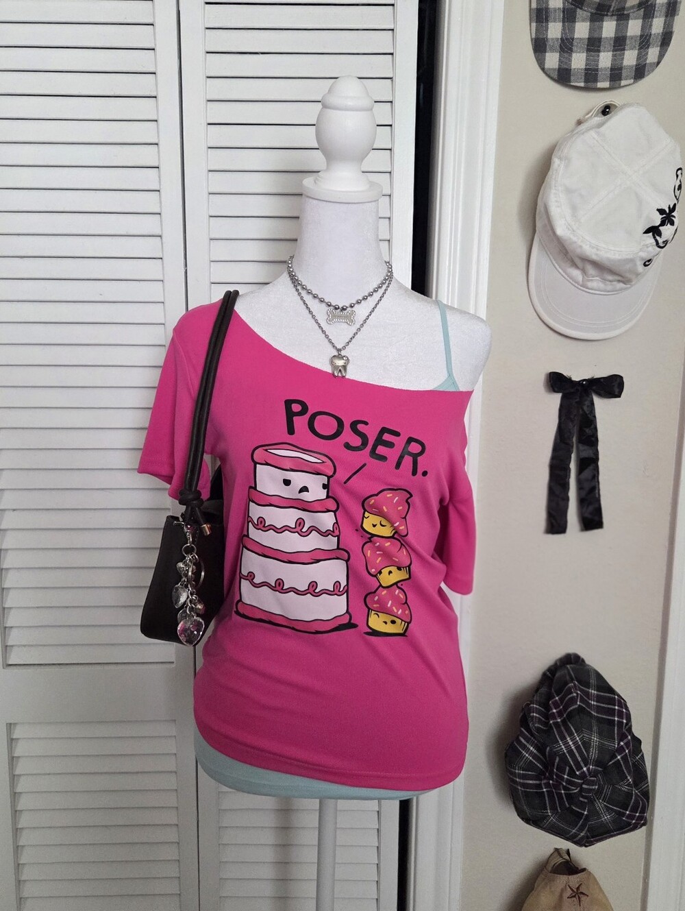 Pink off the shoulder graphic scene tee with "Poser" and cake design